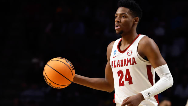 Alabama forward Brandon Miller brings the ball downcourt against Texas A&M Corpus Christi in the first half of a first-round college basketball game in the NCAA tournament.
